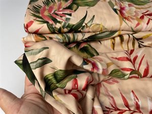 Fastvævet polyester - nude med blomster og blade